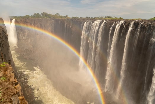 A rainbow over Victoria Falls, Zimbabwe, Africa. photo