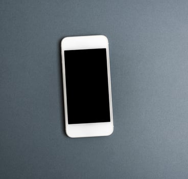 white smartphone with blank black screen photo
