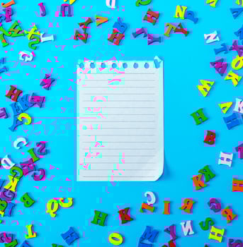 empty paper sheet in a line on a blue background photo