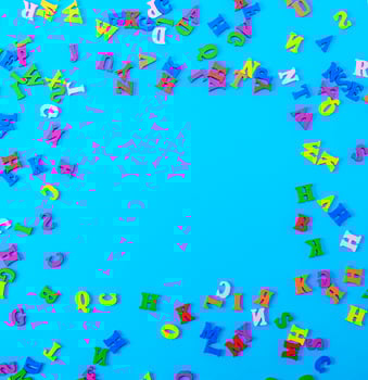 multicolored English alphabet letters on a blue background photo
