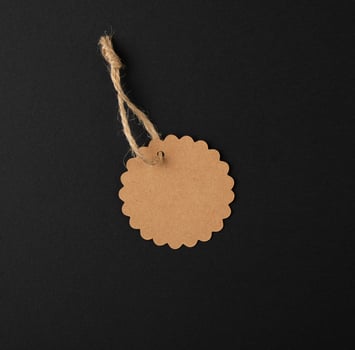 empty paper round brown tag on a rope photo
