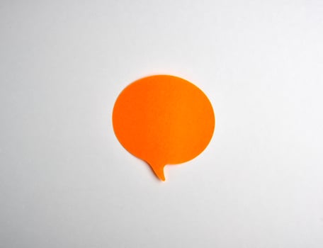 orange paper cloud sticker on white background photo