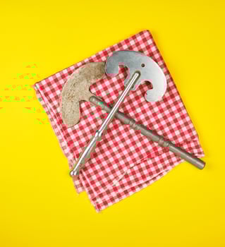 two old iron hatchets  for cutting meat or vegetables photo