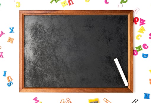 black chalk frame and  piece of white chalk photo