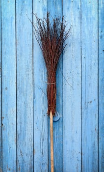 A broom with a wooden handle photo
