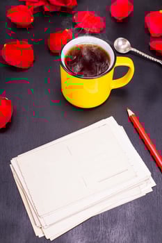 empty old paper postcards with a red pencil photo