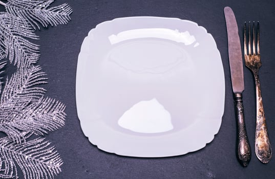 white square ceramic plate with cutlery photo