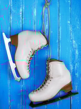 pair of white leather female skates for figure skating photo
