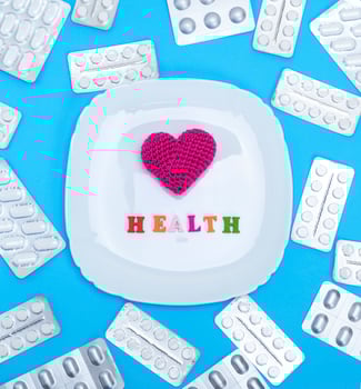 white square ceramic plate with red heart and inscription health photo