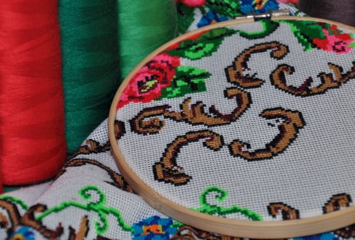 Detail of the embroidery hoop in a cross photo