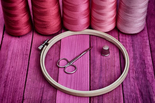 Hoop with threads for sewing and embroidery photo