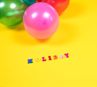 Inscription holiday and balloons photo