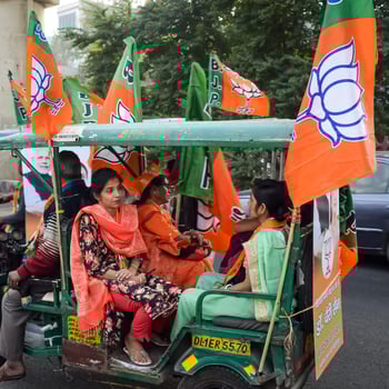 Delhi, India, December 02 2022 -Bharatiya Janata Party BJP supporter during mega road show in support of BJP candidate Pankaj Luthara to file nomination papers ahead of MCD local body Elections 2022 photo