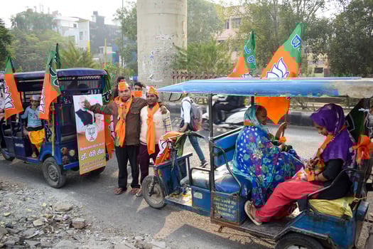Delhi, India, December 02 2022 -Bharatiya Janata Party BJP supporter during mega road show in support of BJP candidate Pankaj Luthara to file nomination papers ahead of MCD local body Elections 2022 photo