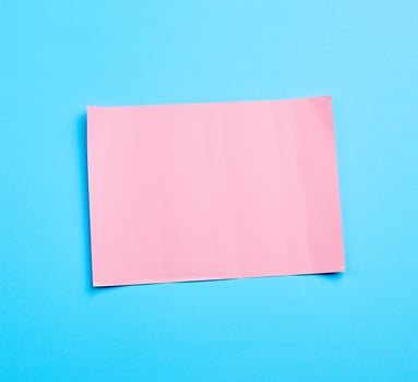blue banner with pink paper sheet curly for paper design photo