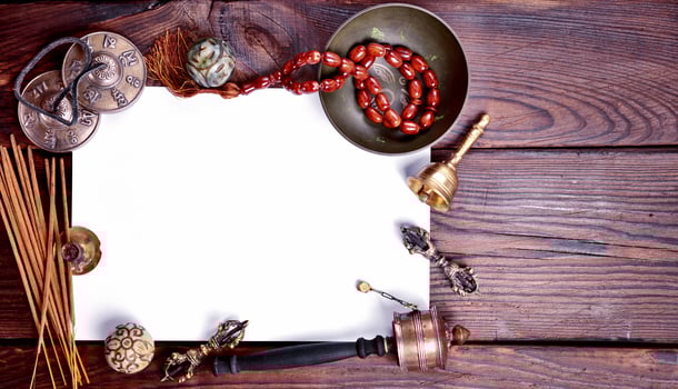 white sheet of paper among musical religious instruments photo