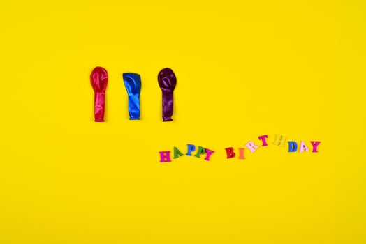 Abstract yellow background with an inscription happy birthday photo