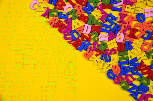 Multicolored wooden letters of the English alphabet photo