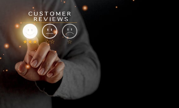 Businessman pressing smiley face emoticon on virtual touch screen. Customer service evaluation concept. Excellent Customer Service Evaluation. photo