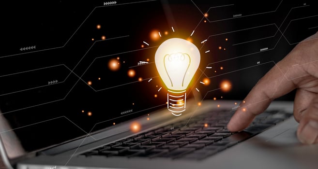hand holding light bulb. idea concept with innovation and inspiration. Bulb light drawing idea in hand photo