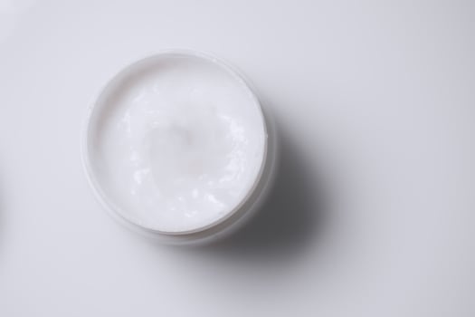 cosmetic cream isolated on white background, organic beauty cosmetics, home spa, flat lay background photo