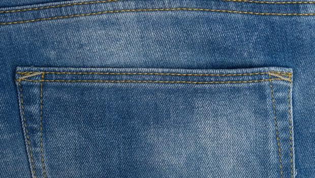 back pocket of blue jeans, full frame photo