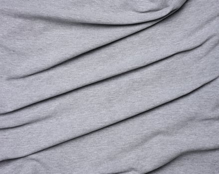 mottled gray cotton fabric for clothing, fabric creased photo