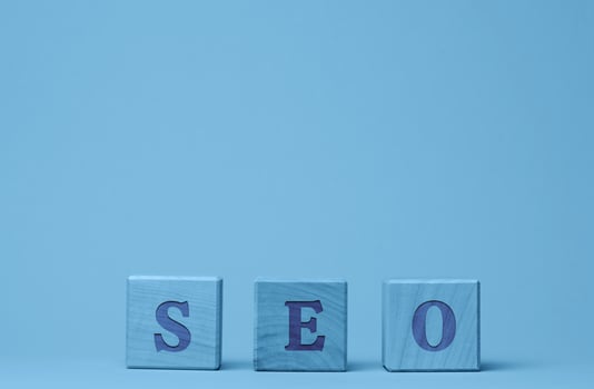 SEO inscription search engine optimization on wooden cubes. photo