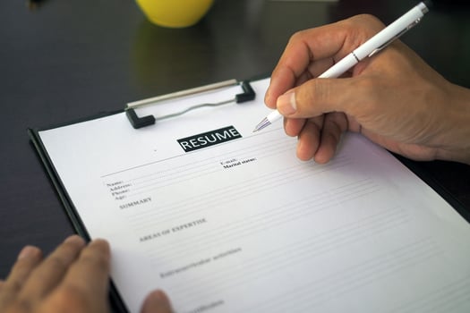 Job seekers, men are filling out a resume on the form. Company launches new employee and Recruitment company. photo