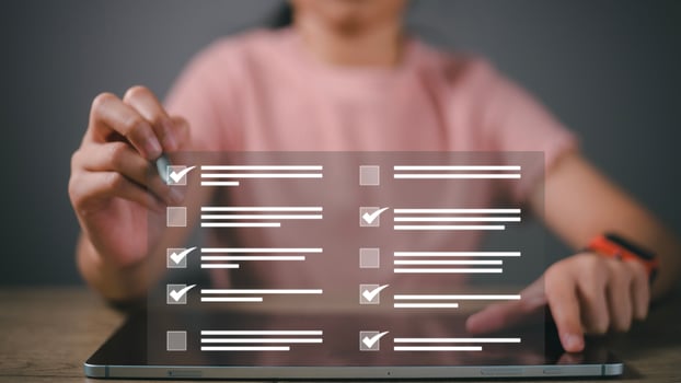businesswoman Take an assessment, questionnaire, evaluation, online survey online exam Choosing the right answer in the exam, filling out an online survey form. Answer the test questions. photo