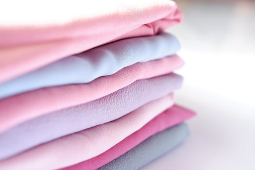 various beautiful and attractive fabrics folded neatly photo