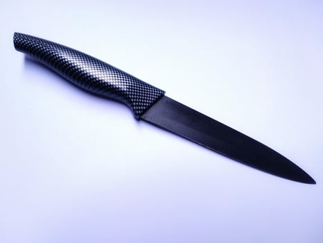 steel kitchen knifes, black knife. isolated on white background photo