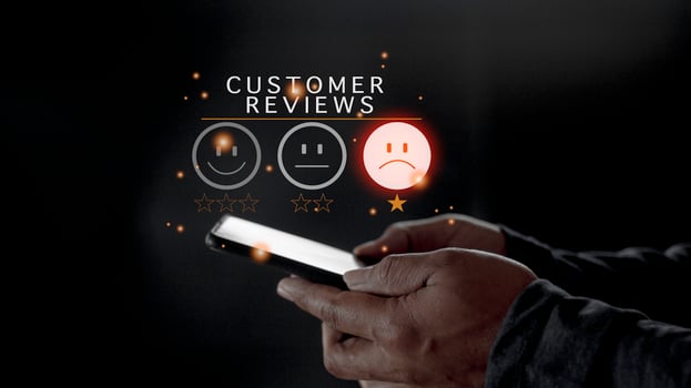 Customer Experience dissatisfied Concept, Unhappy Businessman Client with Sadness Emotion Face on smartphone screen, Bad review, bad service dislike bad quality, low rating, social media not good. photo