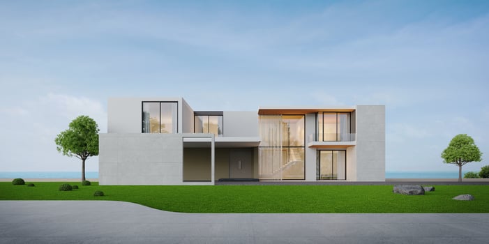 Luxury modern house on grass with sea view and blue sky background,Concept for real estate or property.3d rendering photo