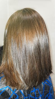 Hair coloring and cutting. Hairstyling in a beauty salon. Hair close-up. photo