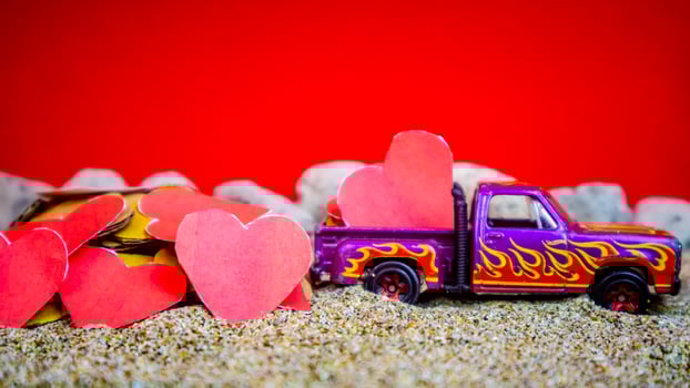 Minahasa, Indonesia  December 2022, the toy cars transporting hearts photo