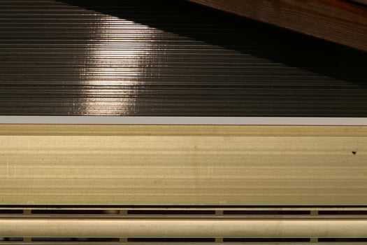 True sunlight and artificial lighting. Abstract photo of light and dark.