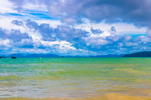 Railay Beach Thailand beautiful famous beach lagoon between limestone rocks. photo