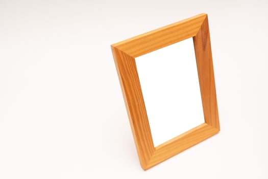 wooden photo frame. photo frame isolated on white background.