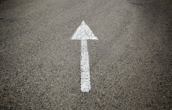 Direction arrow on the asphalt photo