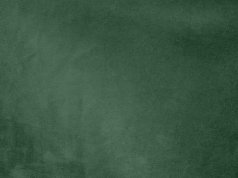 Olive green color velvet fabric texture used as background. light.Olive green fabric background of soft and smooth textile material. There is space for text. photo