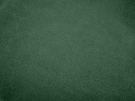 Olive green color velvet fabric texture used as background. light.Olive green fabric background of soft and smooth textile material. There is space for text. photo