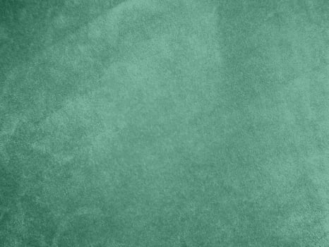 Padua green velvet fabric texture used as background.Light green fabric background of soft and smooth textile material. There is space for text. photo