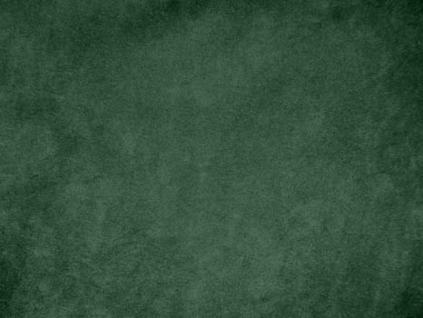 Olive green color velvet fabric texture used as background. light.Olive green fabric background of soft and smooth textile material. There is space for text. photo
