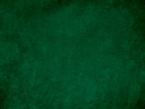 Dark green old velvet fabric texture used as background. Empty green fabric background of soft and smooth textile material. There is space for text.. photo