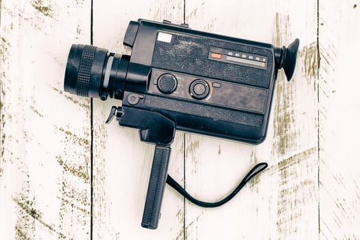 Old vintage analog video camera black colored photo