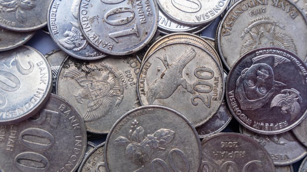 pile of rupiah coins as background photo