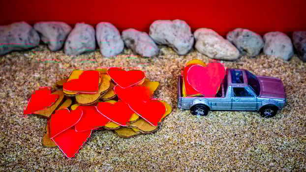 Minahasa, Indonesia  December 2022, the toy cars transporting hearts photo