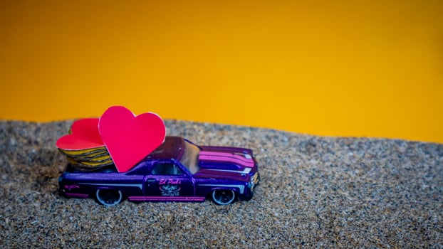 Minahasa, Indonesia  December 2022, the toy cars transporting hearts photo