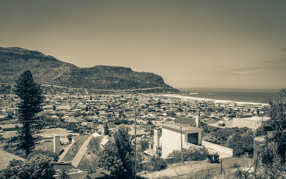Fish Hoek Beach at False Bay turquoise water Cape Town. photo